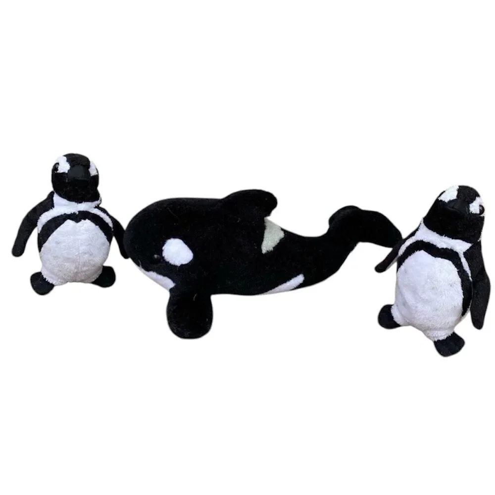 Lot of three stuffed animals from Sea World. One whale (Shamu) & 2 Penguins